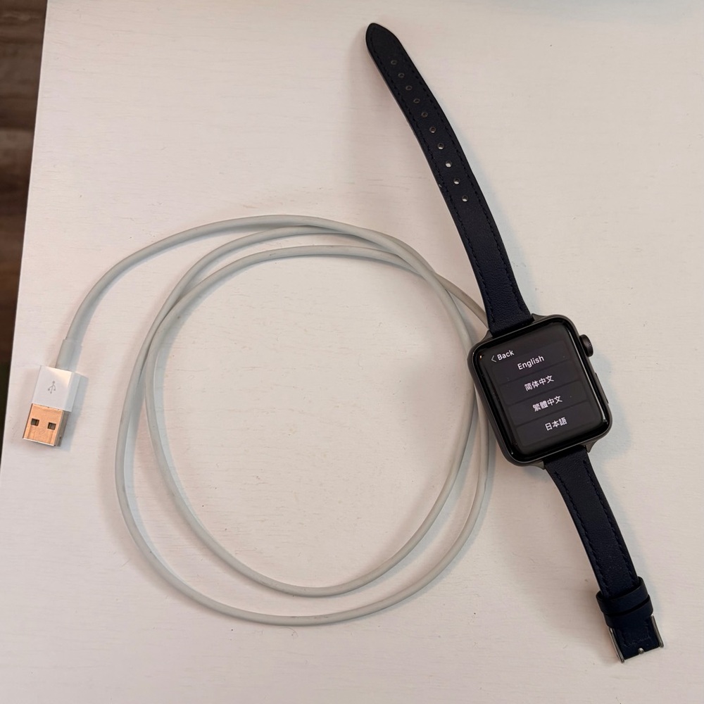 Apple Smartwatch Series 3 42 mm with Navy Strap & Charger.
